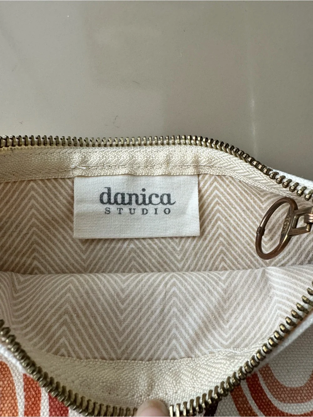 Danica Studio canvas zip pouch with terracotta rainbow screen-print design